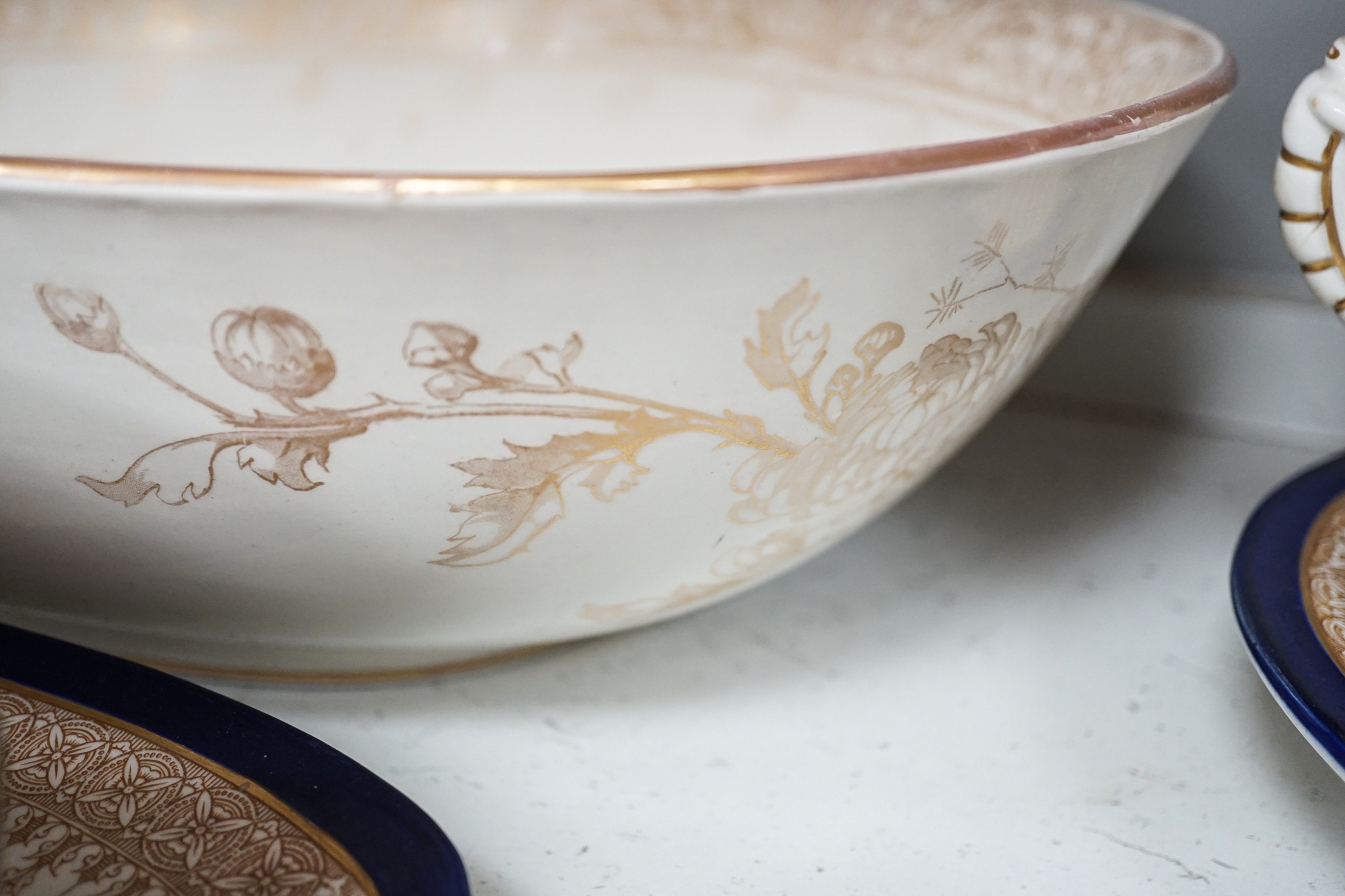 A Royal Worcester vitreous part dinner service, and a Doulton Burslem basin, 44cm